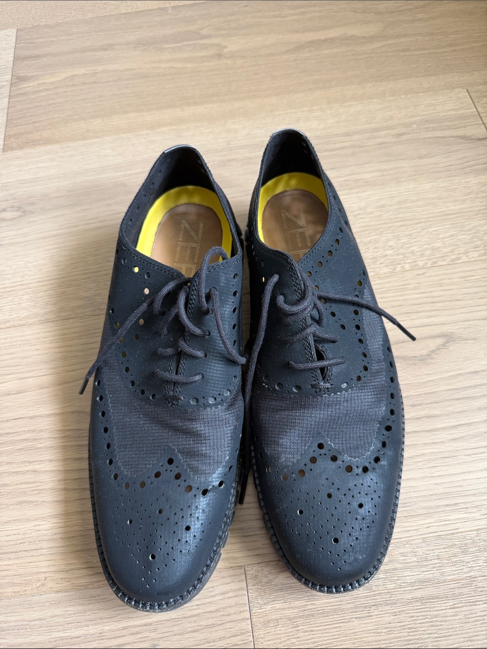 Cole Haan Black Wingtip Oxford Shoes with Yellow Insole Accents
